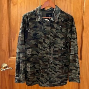 Jut from the Kloth, silver studded camp jacket.